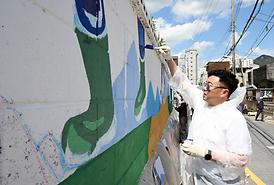 망월로 벽화그리기 행사(호원동 119-145)